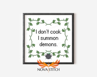 May include: Cross stitch pattern featuring a green leafy border with the text "I don't cook. I summon demons." and a black cauldron with green steam.