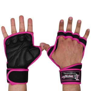 May include: Pink and black weightlifting gloves with a wrist strap. The gloves have a textured palm and finger holes. The wrist strap has the text "Estremo" and "Champions of the world" printed on it.
