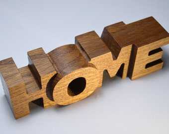 Wooden word Home from dark oak.