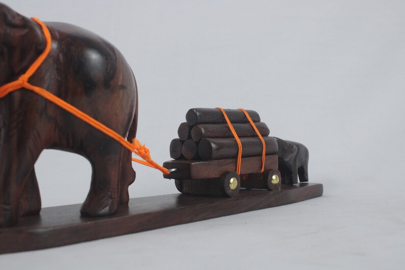 Hand Carved Rosewood Elephant pulling logs Showpiece