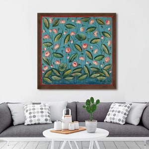 May include: A framed painting of a blue background with pink and white lotus flowers and green leaves. The painting is in a brown frame.
