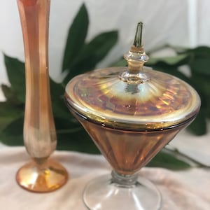 Iridescent Orange Carnival Glass set- Covered candy dish and bud vase.