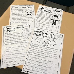 Puede incluir: Varias hojas de actividades con temática de Halloween con ilustraciones y preguntas. Las hojas presentan personajes como una calabaza, un vampiro, un monstruo y un murciélago. Las hojas están sobre una superficie marrón claro.