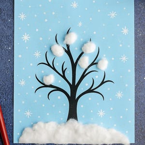 May include: A winter-themed greeting card featuring a black tree silhouette with cotton ball accents on a light blue background. White cotton simulates snow at the base and on the tree branches. White snowflakes are scattered across the card.