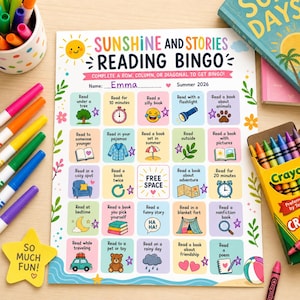 May include: A colorful reading bingo game with the title "Sunshine and Stories." The bingo card features various reading-related activities, illustrations, and the name "Emma." Crayola crayons and markers surround the bingo card, with a yellow star-shaped sticker that says "So Much Fun!"