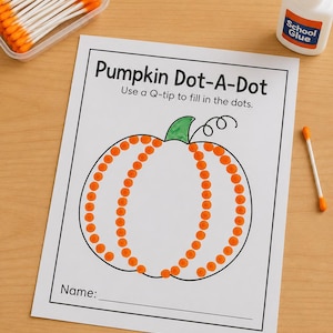 May include: A white activity sheet titled Pumpkin Dot-A-Dot with instructions to use a Q-tip to fill in the dots. The sheet features a black outline of a pumpkin with orange dots, a green stem, and a line for a name. Includes a container of orange-tipped cotton swabs and a bottle of school glue.