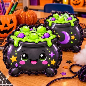 May include: Two black cauldron-shaped containers featuring a smiling face with large eyes, pink cheeks, and a wide mouth. The top of each cauldron is filled with bright green bubbling liquid and purple spheres, decorated with yellow stars and purple moons.