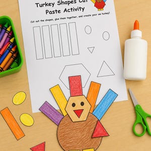 May include: A Turkey Shapes Cut Paste Activity worksheet with instructions, a green crayon bin, a white glue bottle, and green scissors. A completed turkey craft made of colored paper shapes including a brown circle, hexagon, and triangles.
