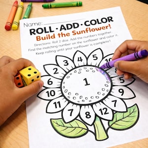 May include: A worksheet with the text "ROLL ADD COLOR Build the Sunflower!" is being colored with a purple crayon. A yellow die with black dots is held in a hand. Crayons of various colors are scattered around.