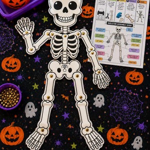 May include: A white paper skeleton craft with black outlines and gold-colored metal fasteners at the joints. The skeleton features a skull, rib cage, pelvis, and articulated limbs. An assembly instruction sheet with text is included next to the figure.