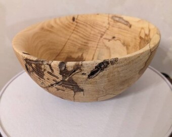 Hand made solid wood food safe Ash bowl with natural details.