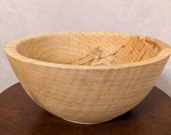 Hand made solid wood food safe Ash bowl with natural details.