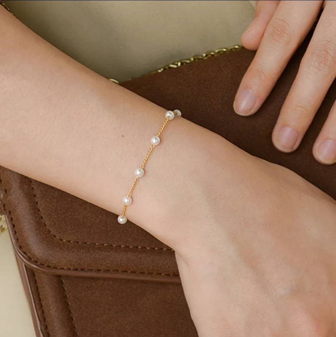 Buy Estele Rhodium Plated Graceful 3 Line Pearl Bracelet for Women Online