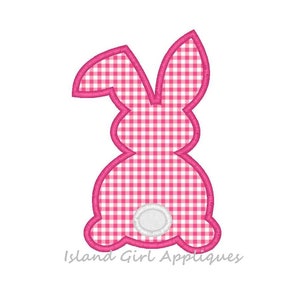 May include: Pink gingham bunny applique with a white tail. This applique is perfect for adding a touch of whimsy to your sewing projects.