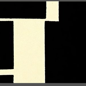May include: Abstract graphic design with a cream-colored shape against a black background. The shape is composed of rectangular and linear elements, with a width of 23.306 inches and a height of 13.108 inches.