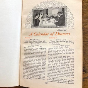 May include: A vintage cookbook page with a calendar of dinners for January 1st and 2nd. The recipes include Black Bean Soup, Roast Leg of Mutton, Currant Jelly, Baked Sweet Potatoes, Macedoine Salad, Cheese Straw, Fruit Cake, Coffee, Palestine Soup, Jagged Hare, Red Currant Jelly, Brussels Sprouts, Endive Salad, Potato Puff, Cheese Fingers, and Vanilla Souffle.