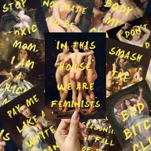 May include: A collection of art prints with yellow text overlayed on classical paintings. The central print reads "IN THIS HOUSE WE ARE FEMINISTS". Other prints feature phrases like "STOP TOXIC", "PAY ME LIKE A WHITE MAN", and "BAD BITCH".