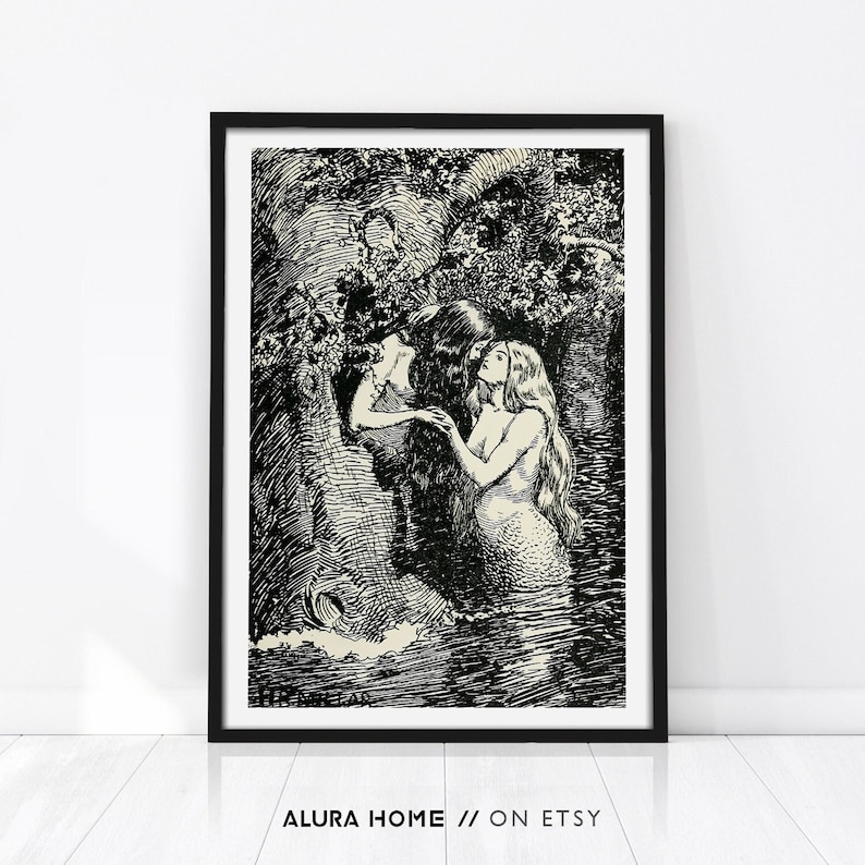 A remastered vintage print of the 1904 illustration "The Nymph caught the Dryad in her arms", showing two mythic female figures embracing beside the water in an intimate black and white scene.