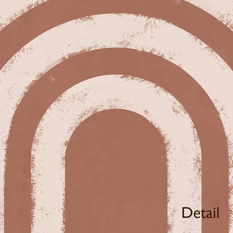 May include: A graphic print featuring concentric arch shapes in shades of terracotta and cream. The design displays a textured, distressed paint effect along the edges of the arches. The word Detail is printed in the bottom right corner in brown.