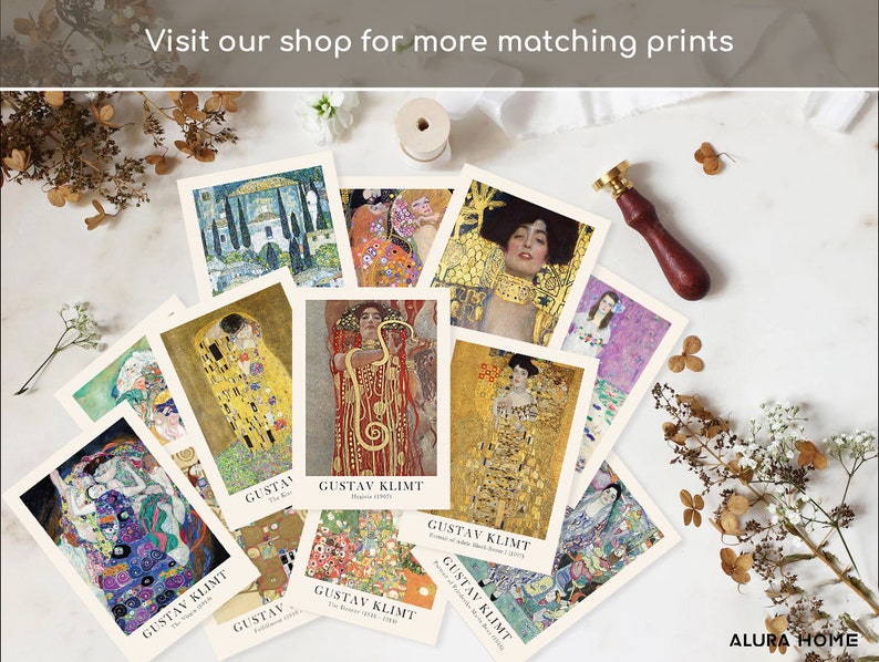 May include: A collection of rectangular art prints featuring various paintings by Gustav Klimt, each with a white border and the artist's name printed at the bottom. The prints display vibrant gold, red, blue, and green colors in intricate patterns.