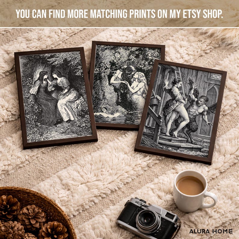 May include: Three framed black and white art prints with dark brown frames. The prints depict scenes of figures in a forest, mermaids, and a demon. The text "YOU CAN FIND MORE MATCHING PRINTS ON MY ETSY SHOP" is at the top. A camera and a cup of coffee are in the foreground.
