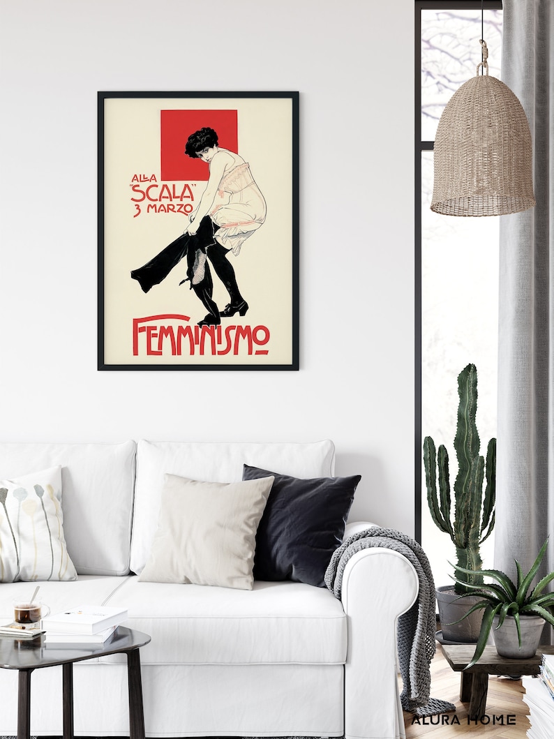May include: A vintage poster with a black and white illustration of a woman in a white dress and black stockings. The poster has a red background with the text "ALLA SCALA 3 MARZO FEMMINISMO" in black.
