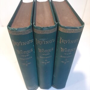 May include: A set of three green hardcover books with gold lettering. The books are titled "Irving's Works" and are numbered 1, 2, and 3. The books are part of a collection of works by Washington Irving.