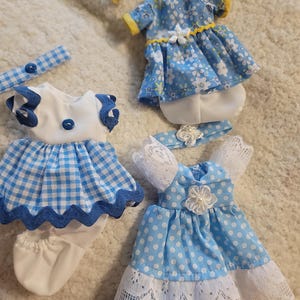 Conjuntos de mini muñecas de silicona de 7 pulgadas, suéteres, ropa de vestir, ropa de silicona para muñecas reborn, cosida a mano y personalizada.