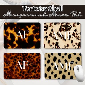 May include: Four rectangular mouse pads with a tortoise shell pattern and white monogrammed initials. The top of the image has the text "Tortoise Shell Monogrammed Mouse Pad". A white computer mouse is on the right.