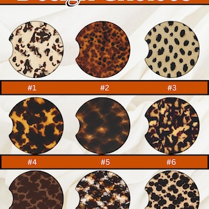 May include: Nine car coasters with various animal print designs are displayed. The coasters are round with a curved cutout for easy removal. The designs include leopard, tortoise shell, and other spotted patterns. The text "Design Choices" is at the top.