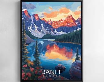 May include: A framed art print of Banff National Park in Canada. The artwork depicts a mountain range with snow-capped peaks, a reflective lake, and evergreen trees. The text "BANFF CANADA" is at the bottom.