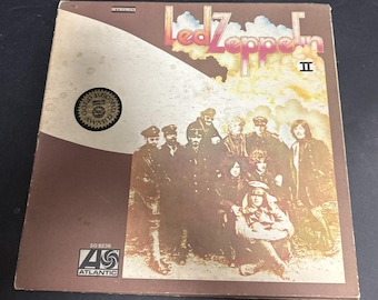 Disco de vinilo LP de Led Zeppelin II, Atlantic Records SD 8236, 1970, con pegatina promocional.