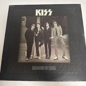 Preowned KISS Dressed To Kill Vinyl Record LP Casablanca NBLP 7016 Rock And Roll All Nite