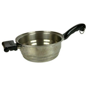 May include: A silver stainless steel saucepan with a black plastic handle. The saucepan has a removable lid and is designed for steaming food.