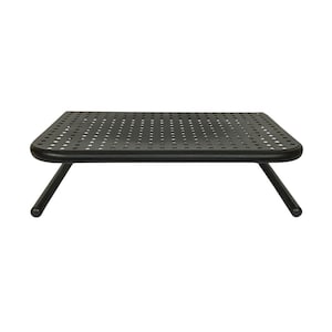 May include: A black metal side table with a perforated top and rounded corners. The table has two angled legs. The table is approximately 18 inches long, 12 inches wide, and 8 inches high.