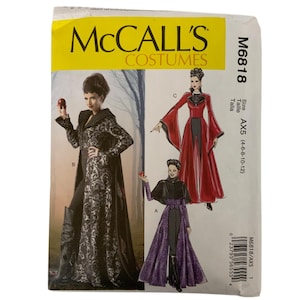 May include: McCall's Costumes sewing pattern M6818. The pattern features illustrations of three different costume designs. The costumes include long dresses and capes in black, red, and purple. The pattern size is AX5 (4-6-8-10-12).
