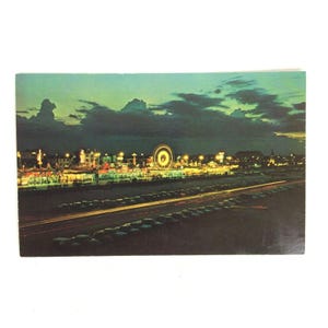 Postal en color de la vista nocturna del paseo marítimo de Daytona Beach, Florida, sin pegar, vintage