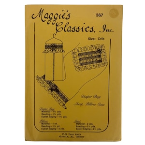 May include: A vintage yellow pattern envelope from Maggie's Classics, Inc. with illustrations of a crib-sized diaper bag, sheet, and pillowcase. The envelope includes material requirements in yards for each item. The text reads "Diaper Bag, Sheet, Pillow Case."