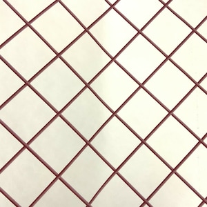 May include: A repeating pattern of dark red lines forming a grid of diamond shapes on a cream-colored background. The lines are evenly spaced, creating a geometric design.