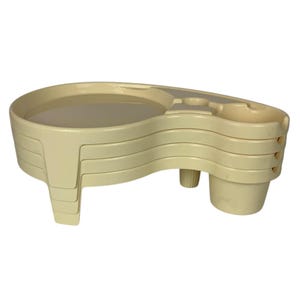 May include: A set of four beige plastic trays with a cup holder. The trays are stacked on top of each other and have a curved shape. The cup holder is on the right side of the trays.
