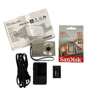 Casio Exilim EX-Z70 7.2MP Digital Camera Silver With Accessories & 8GB SDHC Card