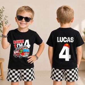 May include: A black t-shirt featuring a red fire truck with a dinosaur driver, the text RAWR! I'M 4 on the front, and the name LUCAS with the number 4 and a red firefighter helmet graphic on the back, paired with black and white checkered shorts.