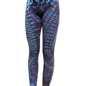 May include: Purple and blue tie-dye leggings with a unique pattern.