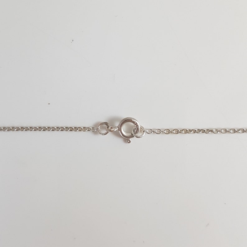 Oval medalford pendant pendant for reticulated silver silver medal set with an Iolite