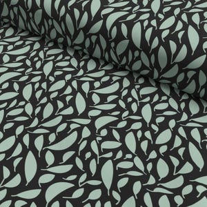 Tessuto di cotone "Blattwerk" con motivi a foglie in nero e verde menta – di snoozeboo