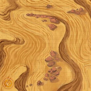May include: A detailed, top-down view of a desert map with a grid overlay. The map features a winding riverbed with reddish-brown rocks and sand-colored terrain. The map has a compass rose in the lower left corner.