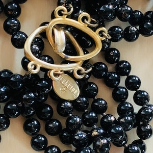 Vintage GEORIOUG Knotted Onyx Triple Strand Necklace
