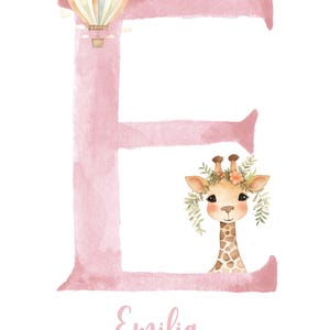 May include: Pink watercolor letter E with a giraffe wearing a flower crown and a hot air balloon above. The name Emilia is written below the letter.