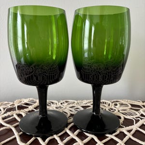 May include: A rustic wooden sign with the text "Welcome to our home" in white lettering. The sign features a distressed finish and a simple, inviting design, perfect for a front porch or entryway.