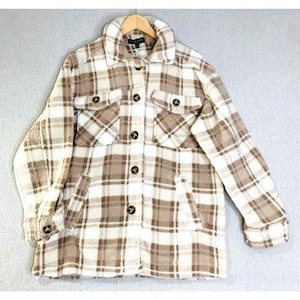 May include: A brown and white plaid flannel shirt with a button-up front and two chest pockets.